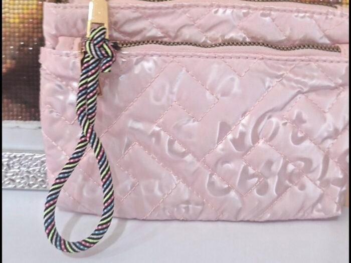 Bolso de mano rosa